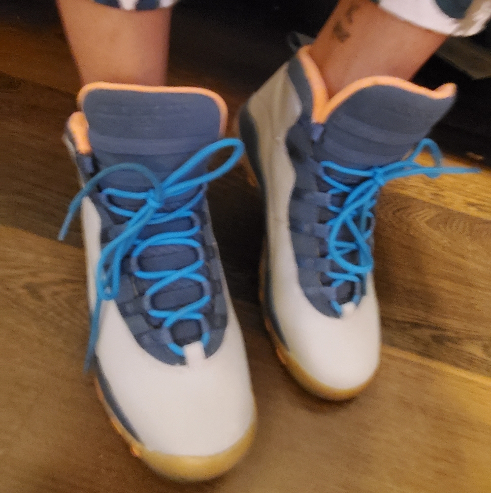 Gray, orange and blue Jordans